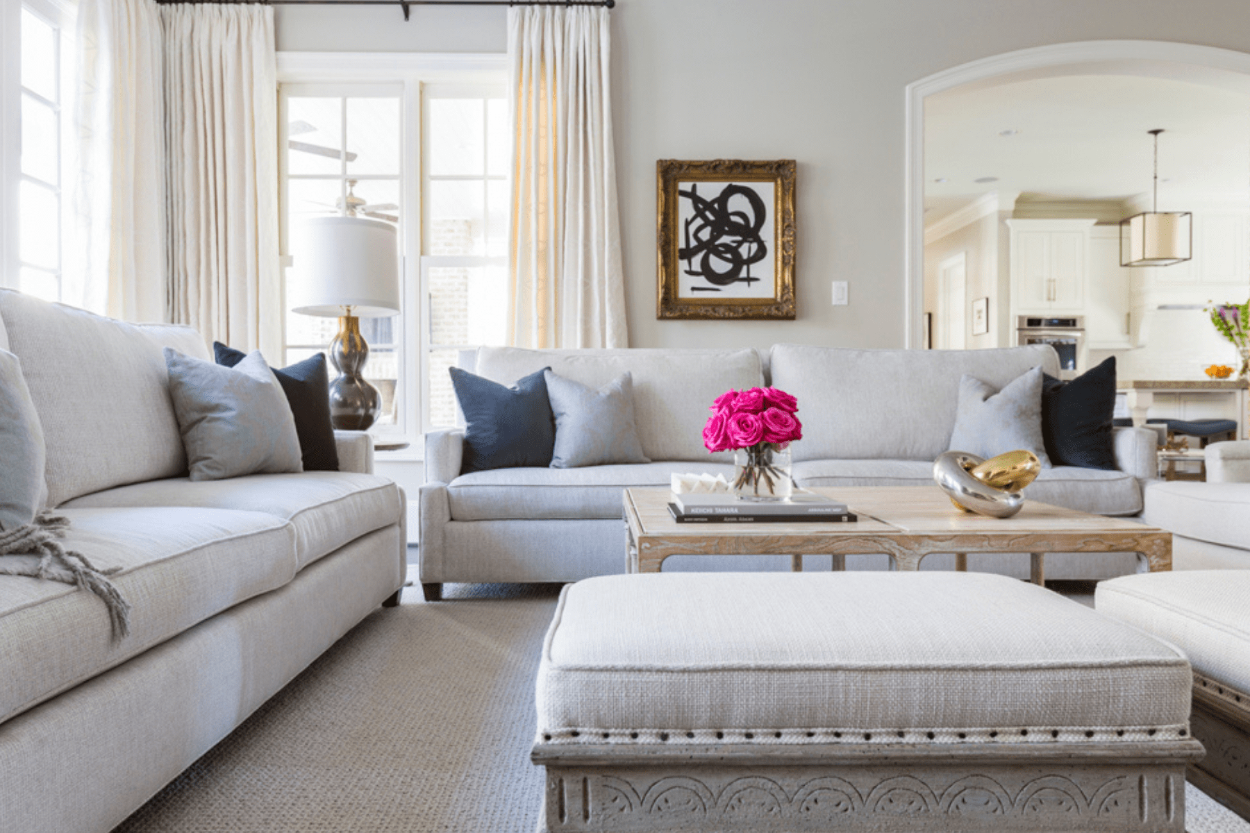 Elegant mix of soft grays create a sense of comfort in the Creekside Residence living room.