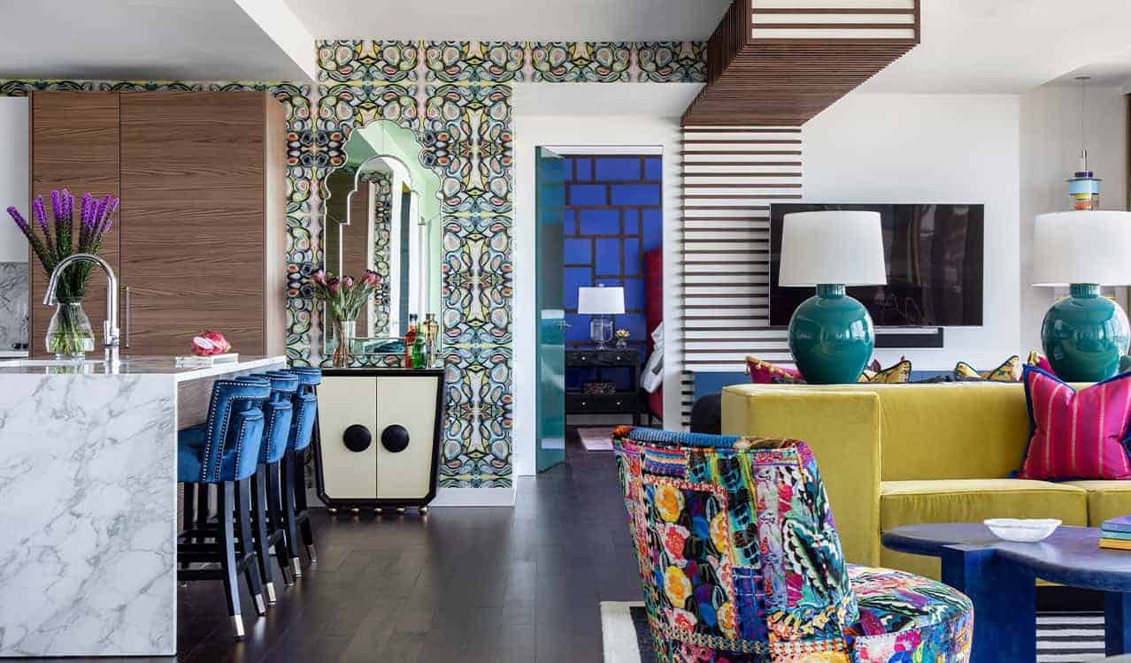 The colorful living room of The River Oaks, designed by Laura U