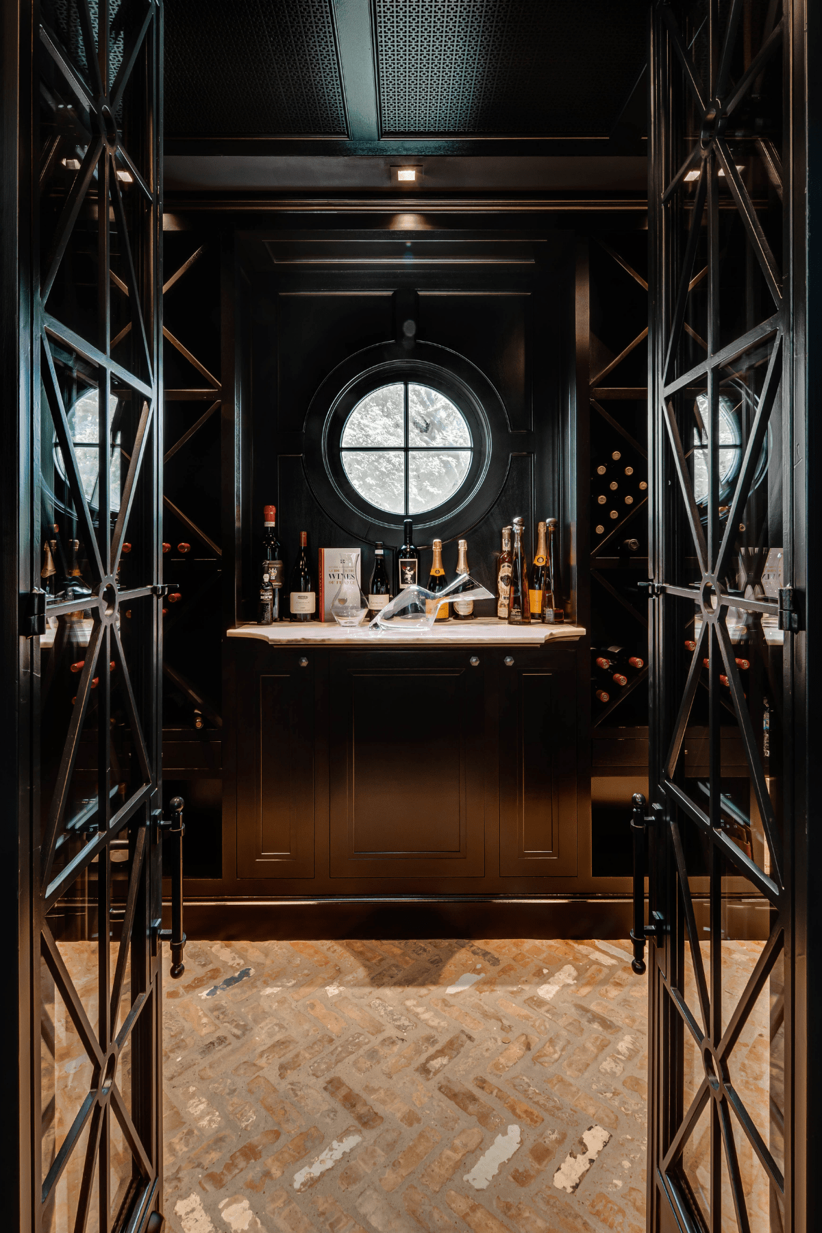 The Willowick wine cellar featuring geometric flooring and furnishing.