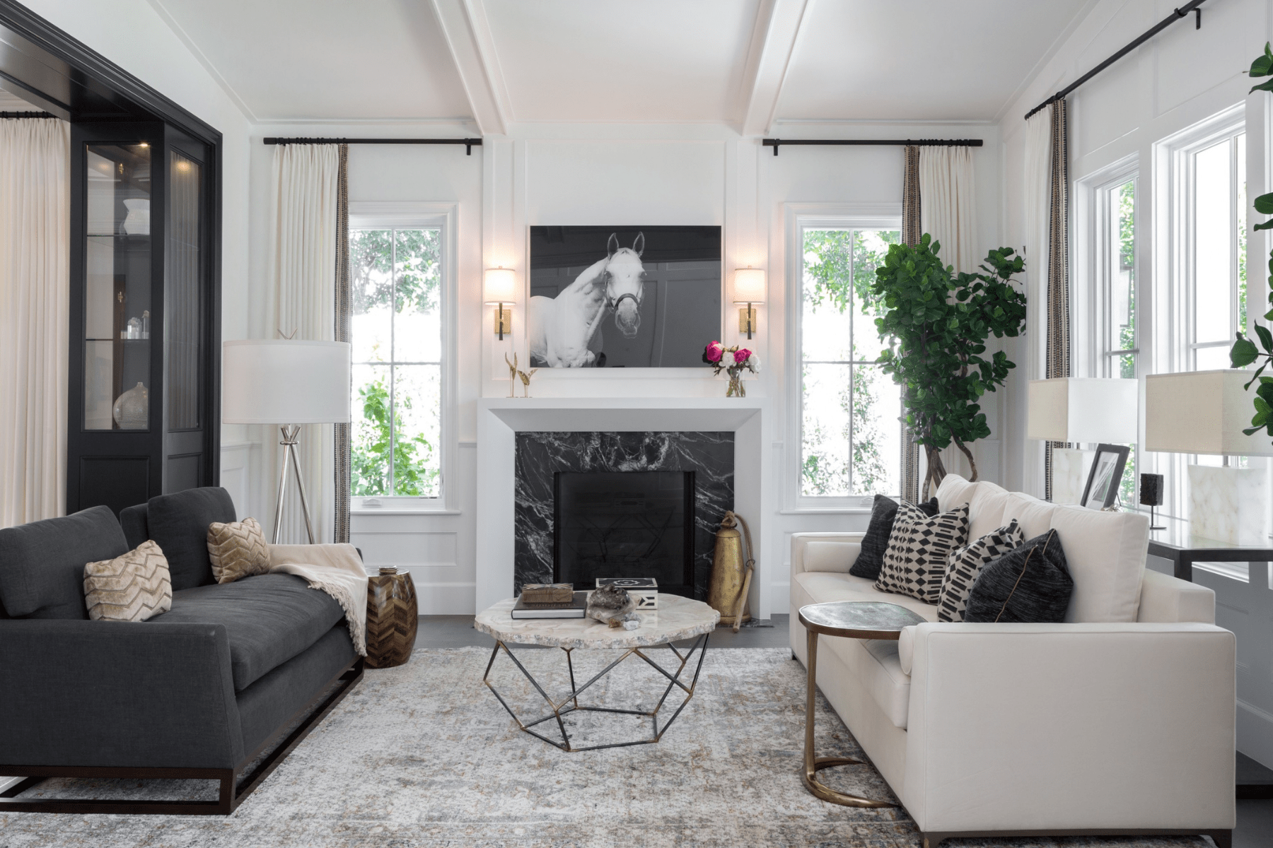 A marble fireplace sits in the center of the Encino parlor surrounded by grounded neutrals.