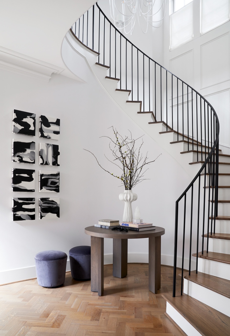 Beautiful wrap around staircase that completes a stunning entryway