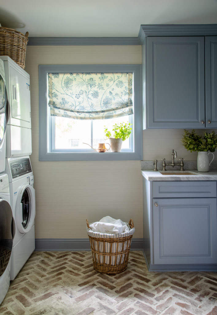 Laundry room designed by Laura U Design Collective 