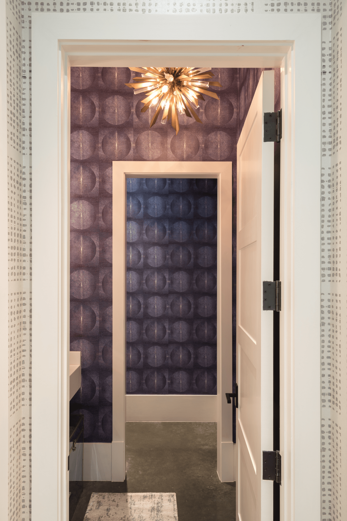 A shot of the custom-colored chagrin wall covering for a Drexel powder room.