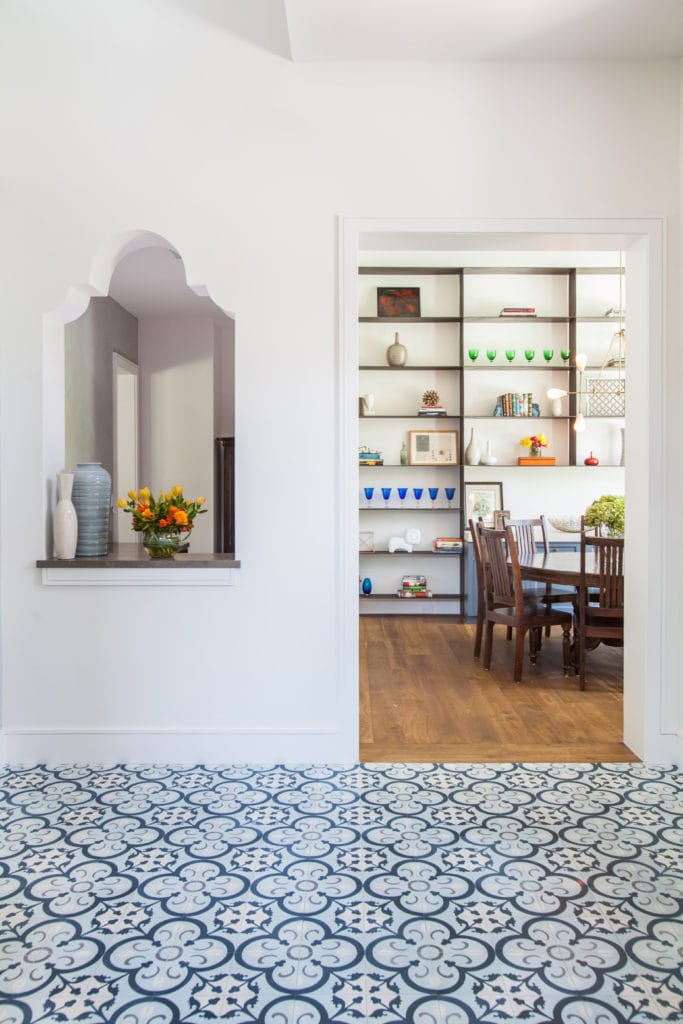 Colorful tile and an Arabesque nook adorn this Houston home, designed by Laura U