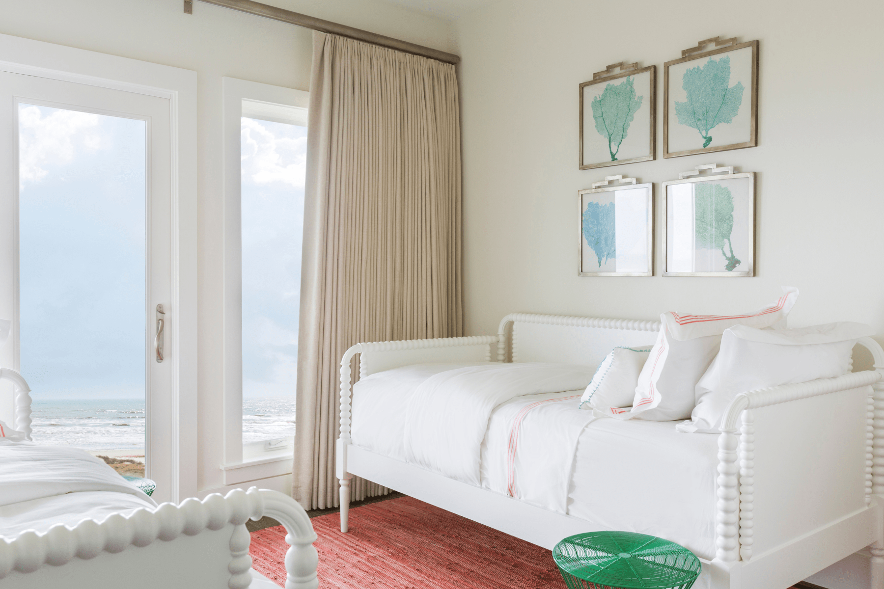 A Sandhill Shores bedroom featuring a mix of white, blue, and peach pieces.