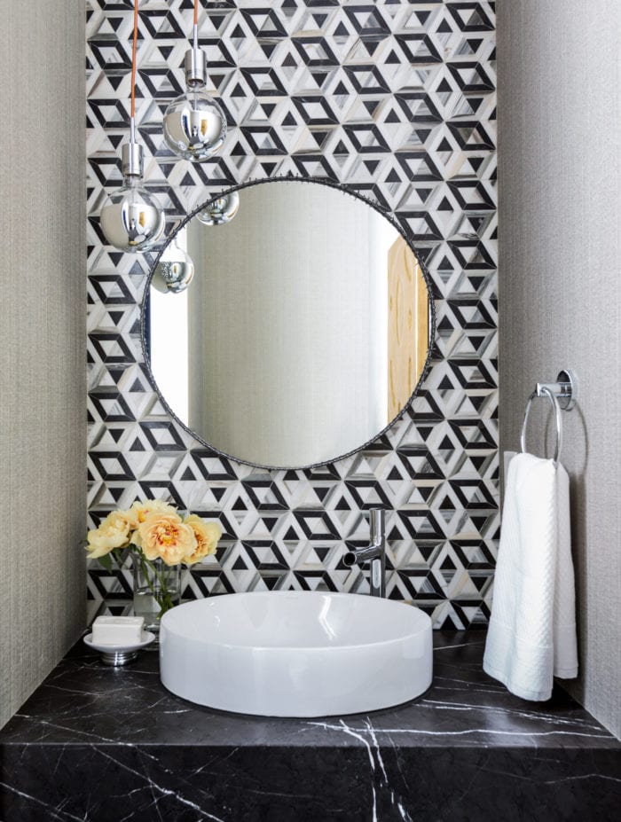 A powder bath with Ann Sacks tile from Kelly Wearstler collection