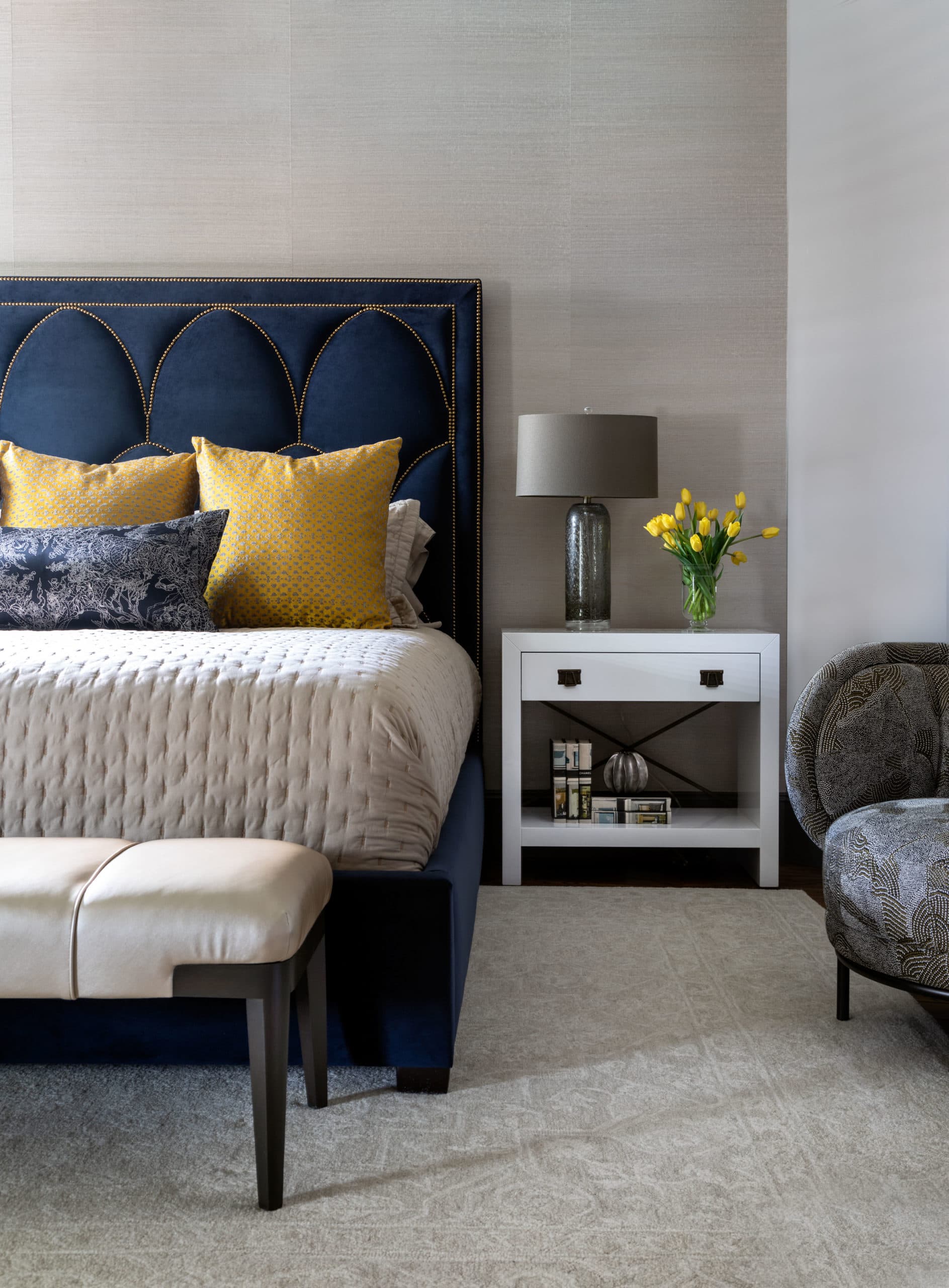 Navy and chartreuse-hued bedroom with Phillip Jeffries wallcovering in Bellaire home