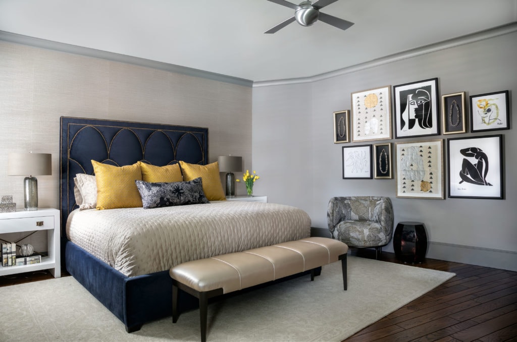Nav and chartreuse guest bedroom in a home designed by Laura U
