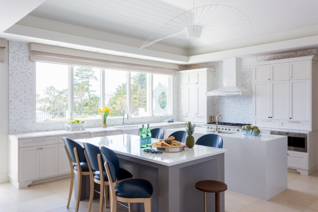Interior design ideas from Pebble Beach include a shimmering backsplash and blue accents 