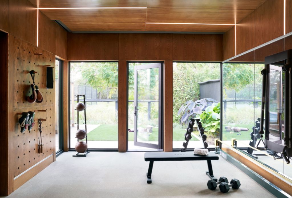 At home gym design by Laura U Design Collective