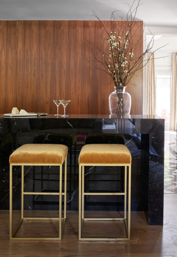 Our team renovated the River Oaks Contemporary home bar into a sophisticated space. 