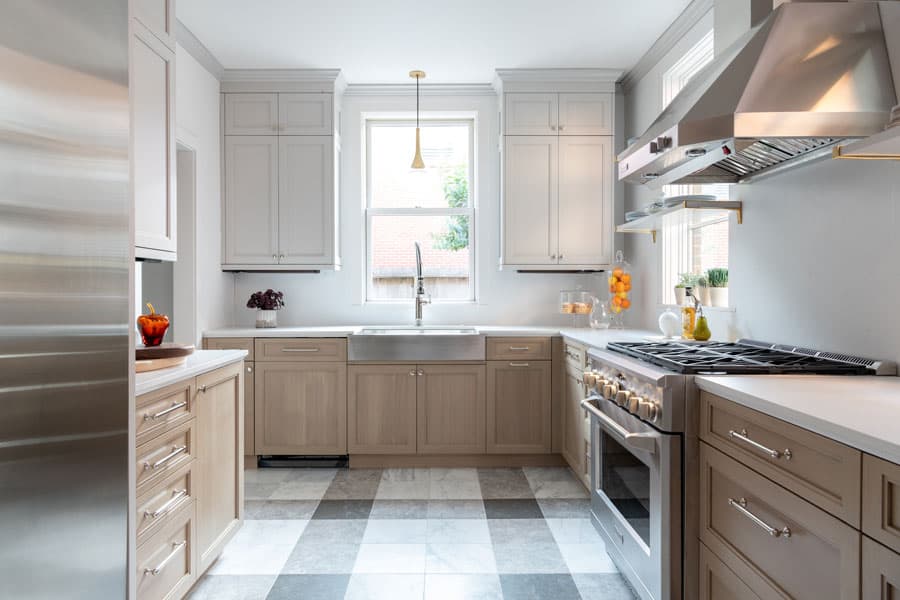 The kitchen at North Boulevard, with gingham tile and Monogram appliances