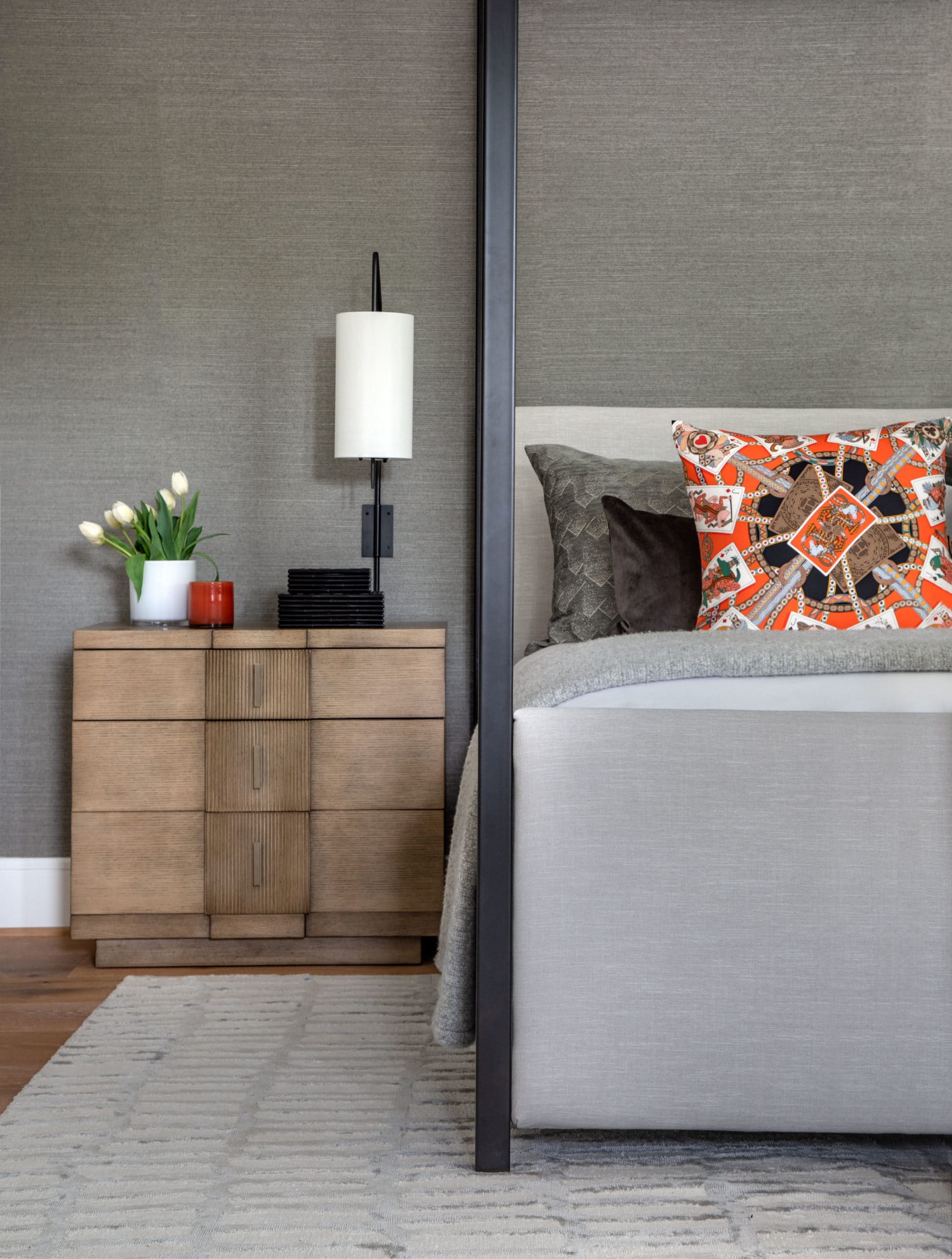 A memorable vignette in a Houston home, designed by Laura U, with Hermes pillow