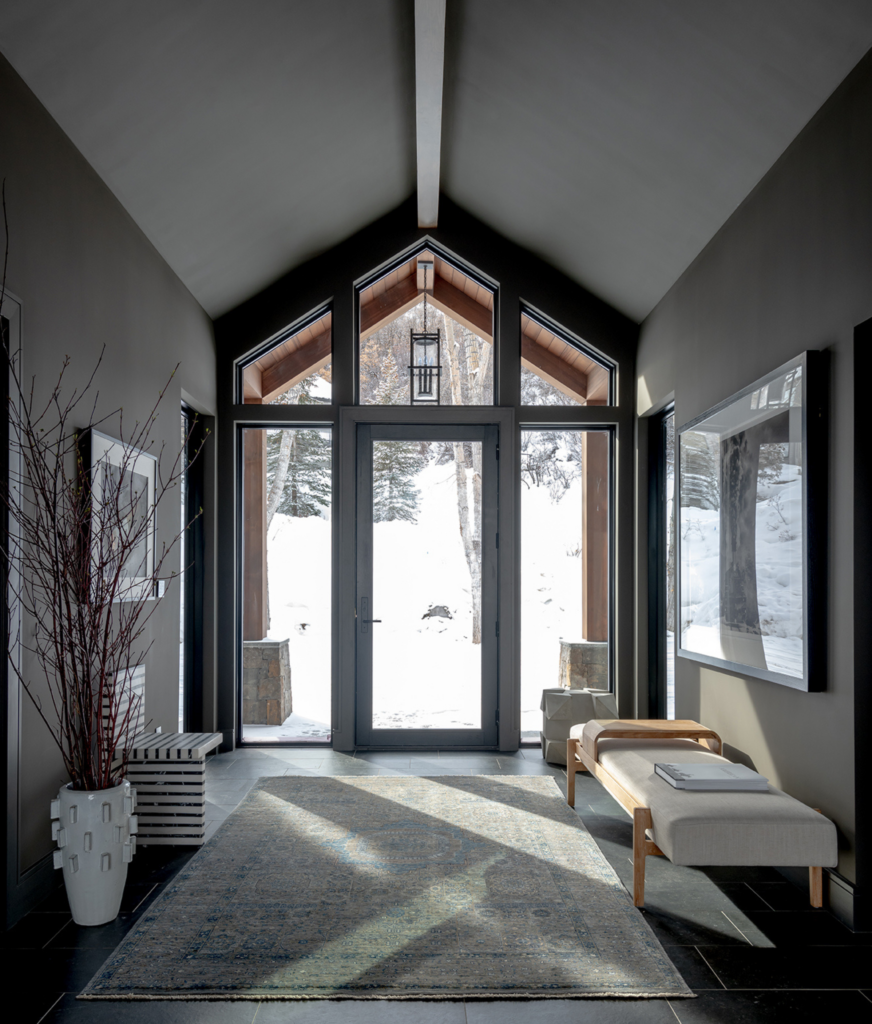 mountain lane show house foyer demonstrates how bringing the outside inside architecture works