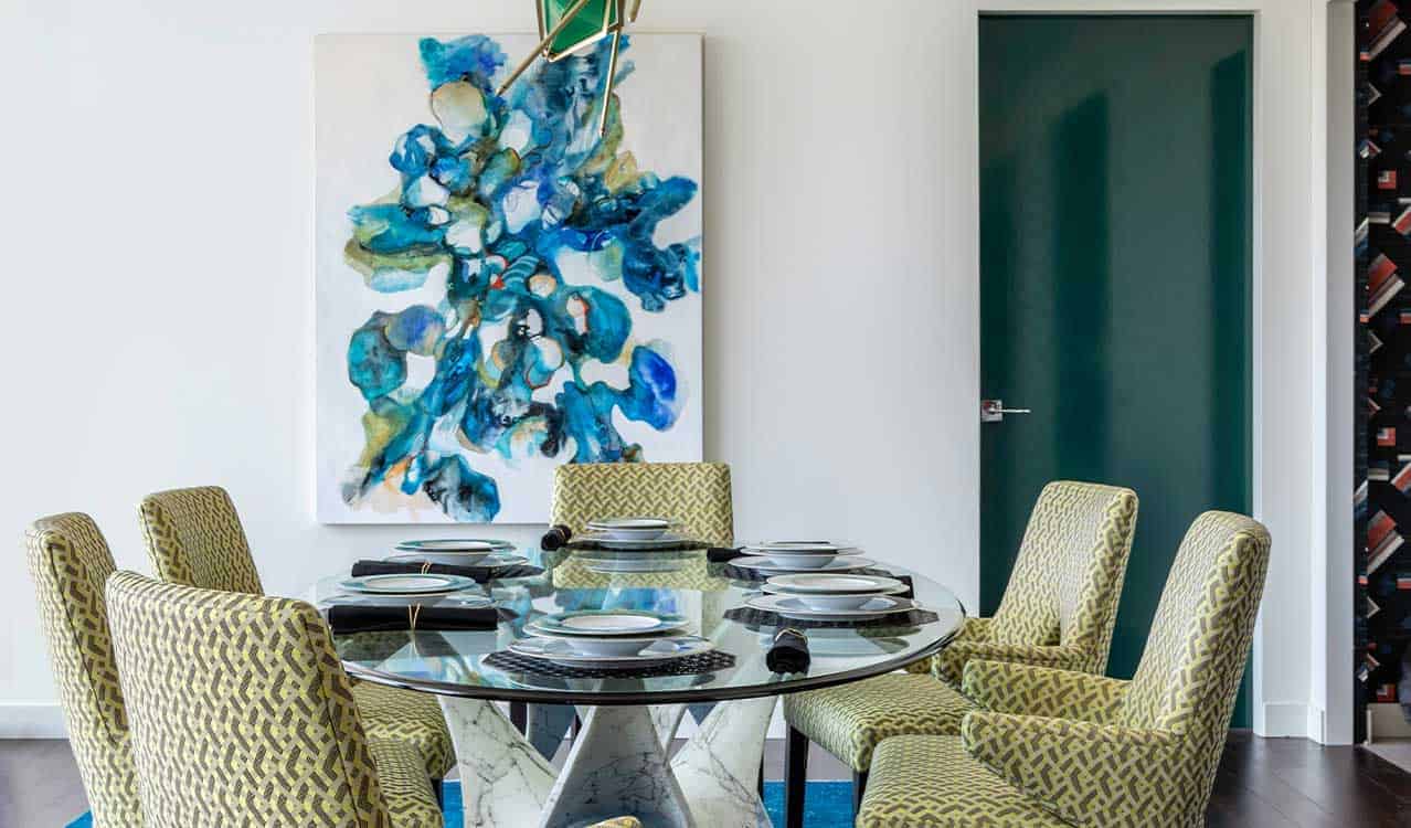 Cookie Ashton painting in elegant dining room by Laura U Interior Design