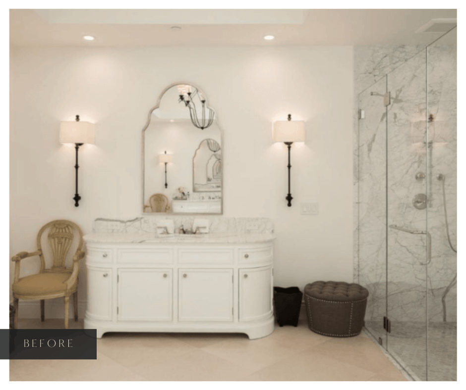A traditional bathroom with glass shower and white vanity