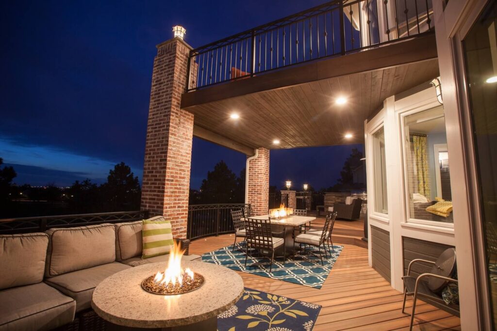 inspiring deck designs include this fire pit under a balcony