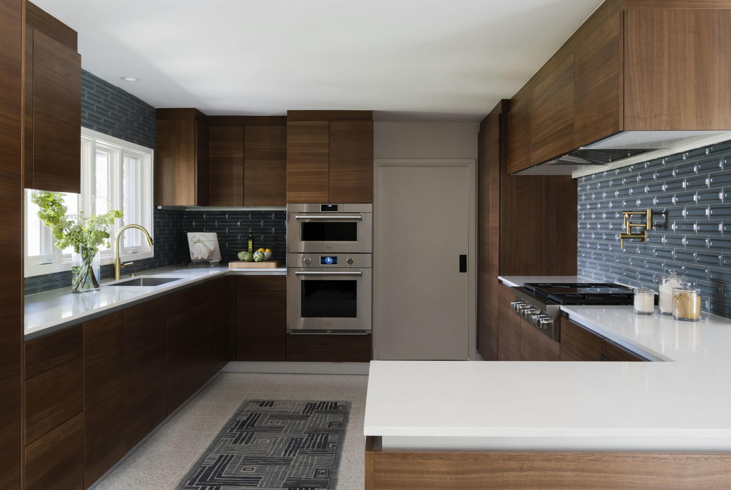 A gorgeous midcentury modern color palette includes deep blues, walnut woods and crips black and white